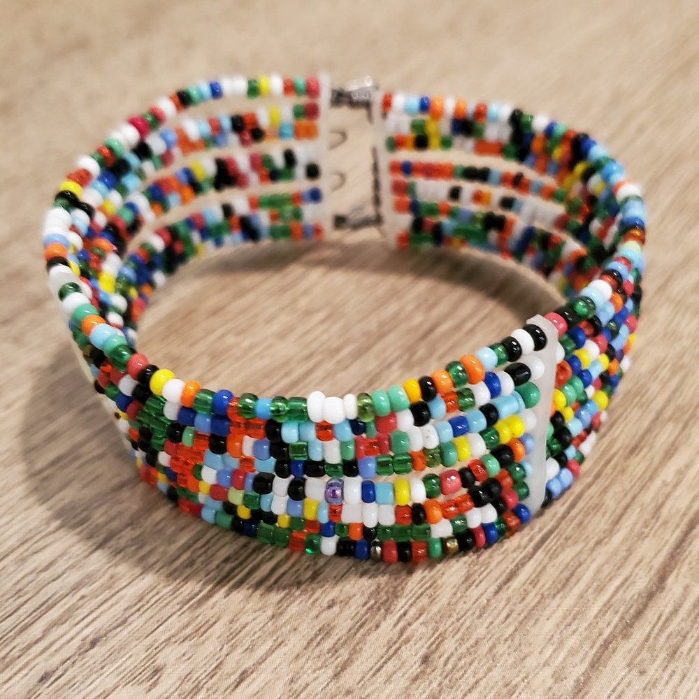 Multi color multi strand glass bead bracelet